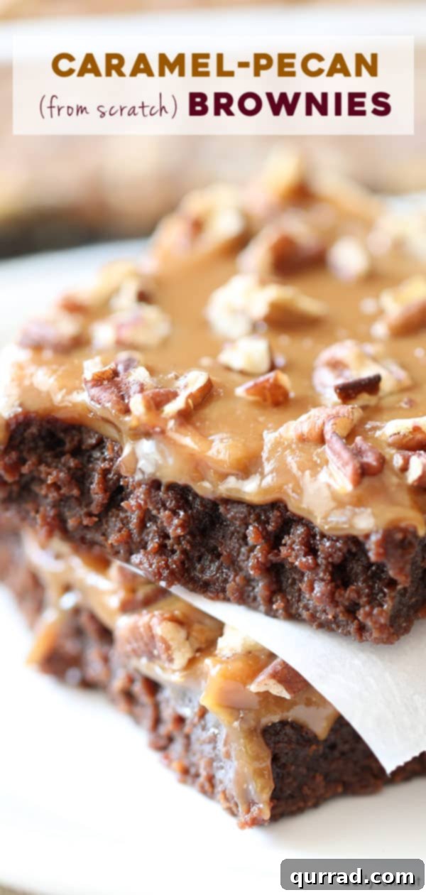 A stunning overhead shot of Caramel Pecan Brownies, showcasing the rich chocolate base, thick gooey caramel layer, and generous sprinkle of chopped pecans. Perfect for pinning and sharing.
