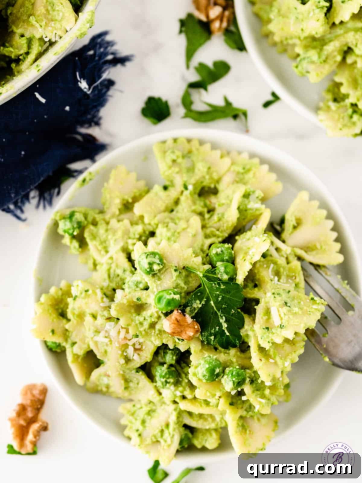 bowtie pasta coated in pea pesto sauce