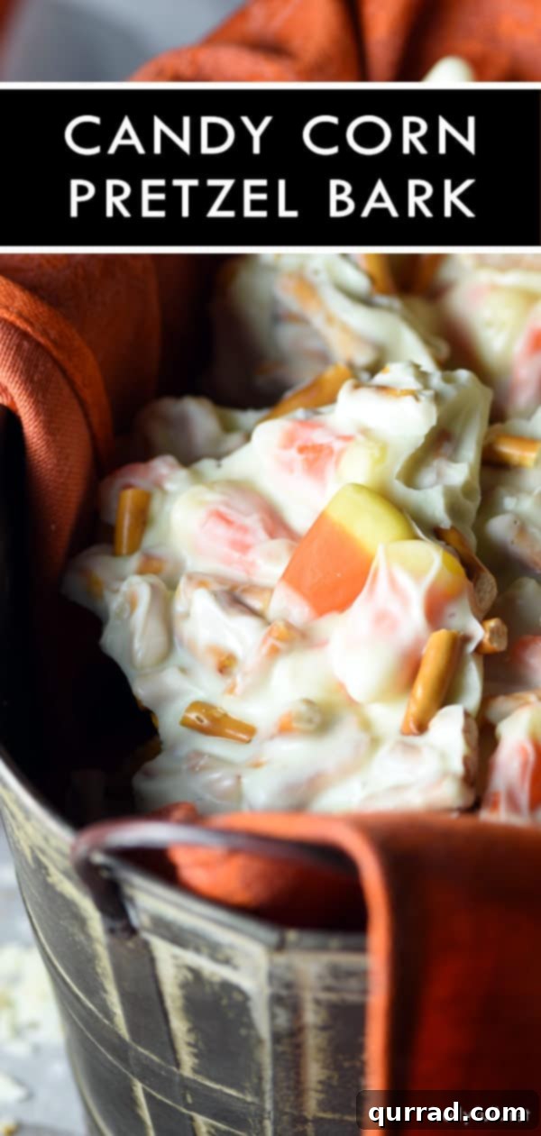 Delicious Halloween Candy Corn Pretzel Bark Halloween Candy Corn Pretzel Chocolate Bark artfully arranged, highlighting the festive and inviting look of this simple treat.