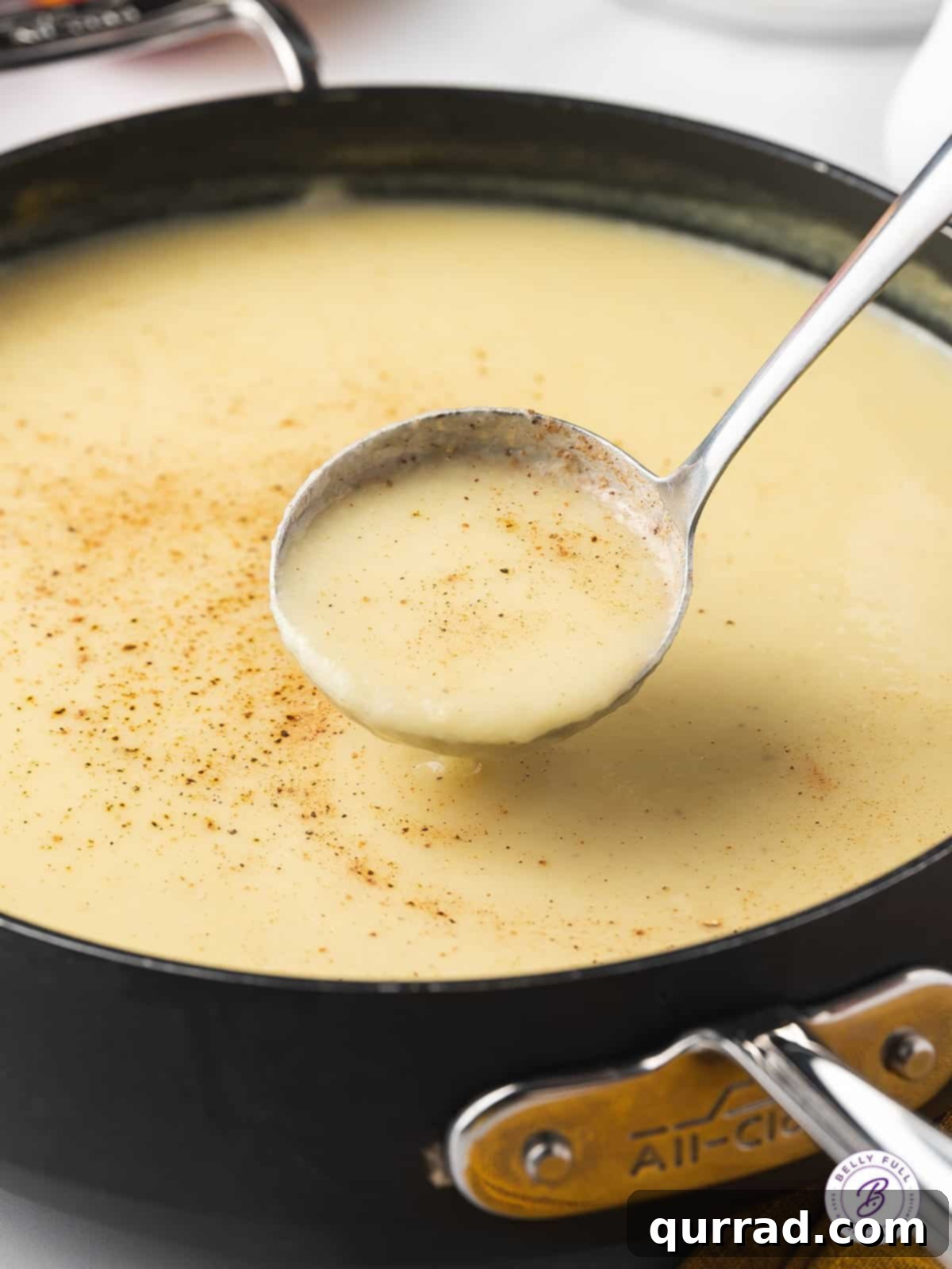 Velvety Parsnip Puree 3 ladle of creamy soup with nutmeg