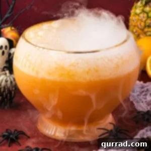 Halloween witches brew in punch bowl with fog