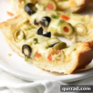 slice of Olive Cheese Bread on plate