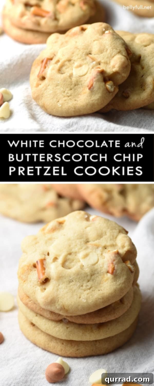 Sweet & Salty Pretzel Crunch Cookies with White Chocolate & Butterscotch 4 Closeup of a freshly baked White Chocolate Butterscotch Pretzel Cookie, showcasing the chips and pretzel bits.
