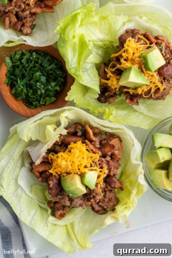 Fiesta Beef Lettuce Cups 2 overhead of beef lettuce wrap with cheddar cheese and avocado