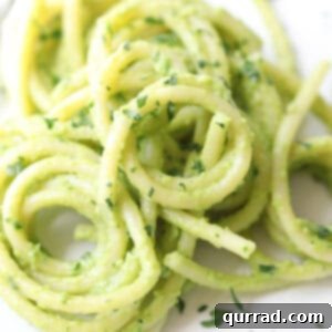 spiral of noodles with creamy avocado sauce