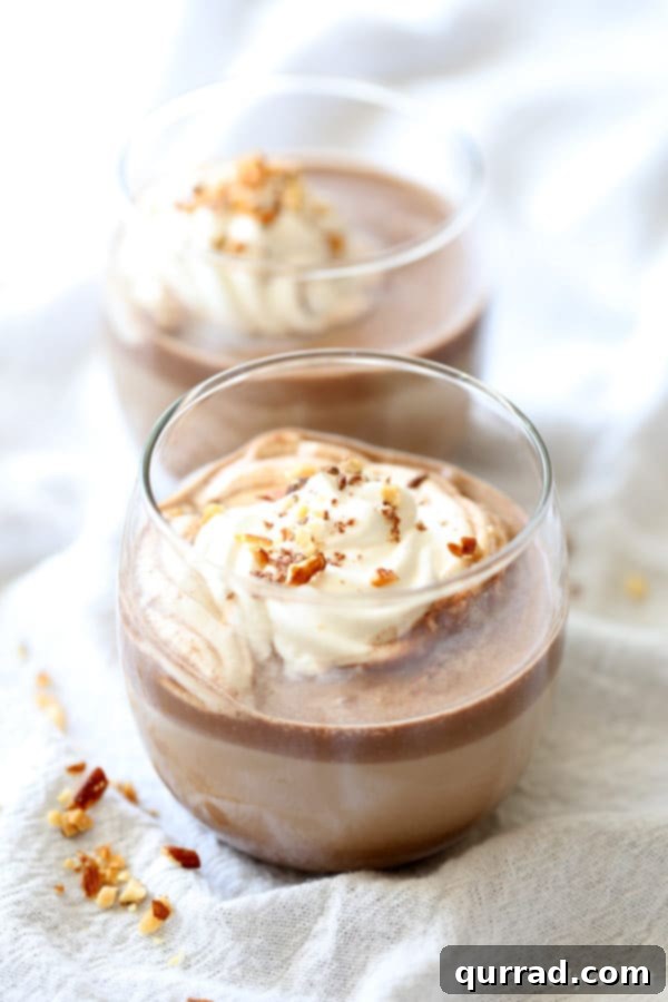 Easy 5-Minute Chilled Nutella Latte with Cold Brew Coffee and Whipped Cream A refreshing chilled coffee drink topped with a generous swirl of whipped cream, perfect for a quick and delightful start or end to the day.