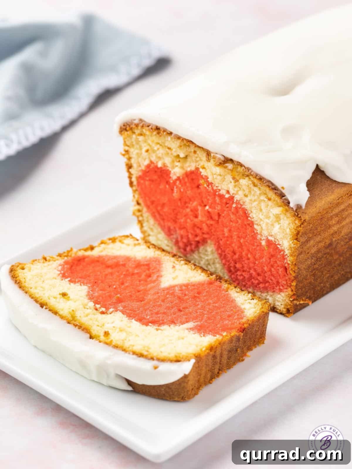 Secret Heart Reveal Cake 4 sliced surprise heart pound cake loaf