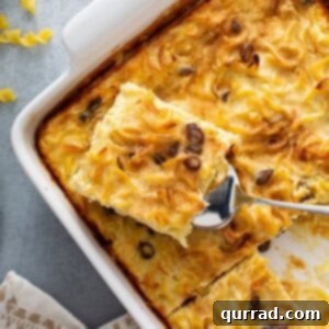 overhead portion of kugel casserole on serving spoon