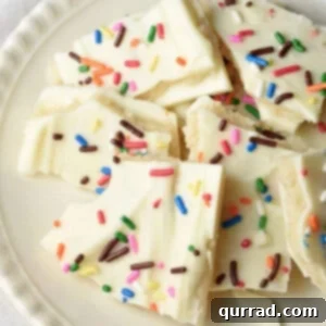 Irresistible Sugar Cookie Bark 5 overhead broken pieces of chocolate cookie bark on plate