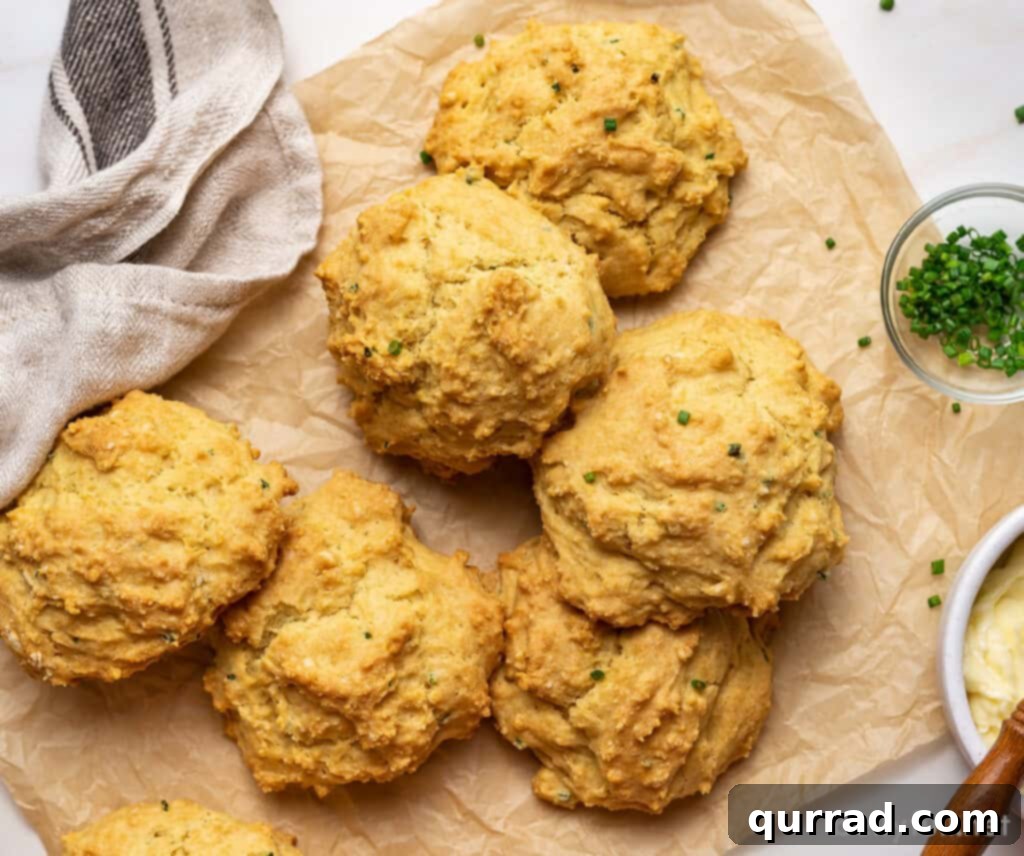 5 golden biscuits piled on brown parchment paper