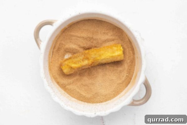 french toast roll coated in cinnamon-sugar