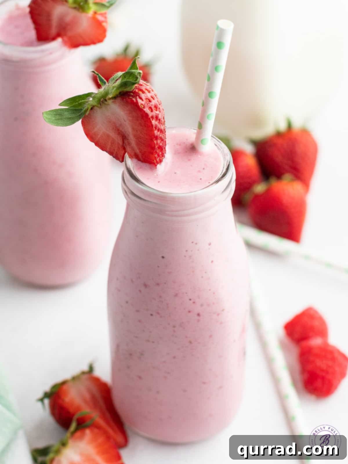 Velvet Strawberry Delight 2 Creamy Strawberry Smoothie in tall glass with straw