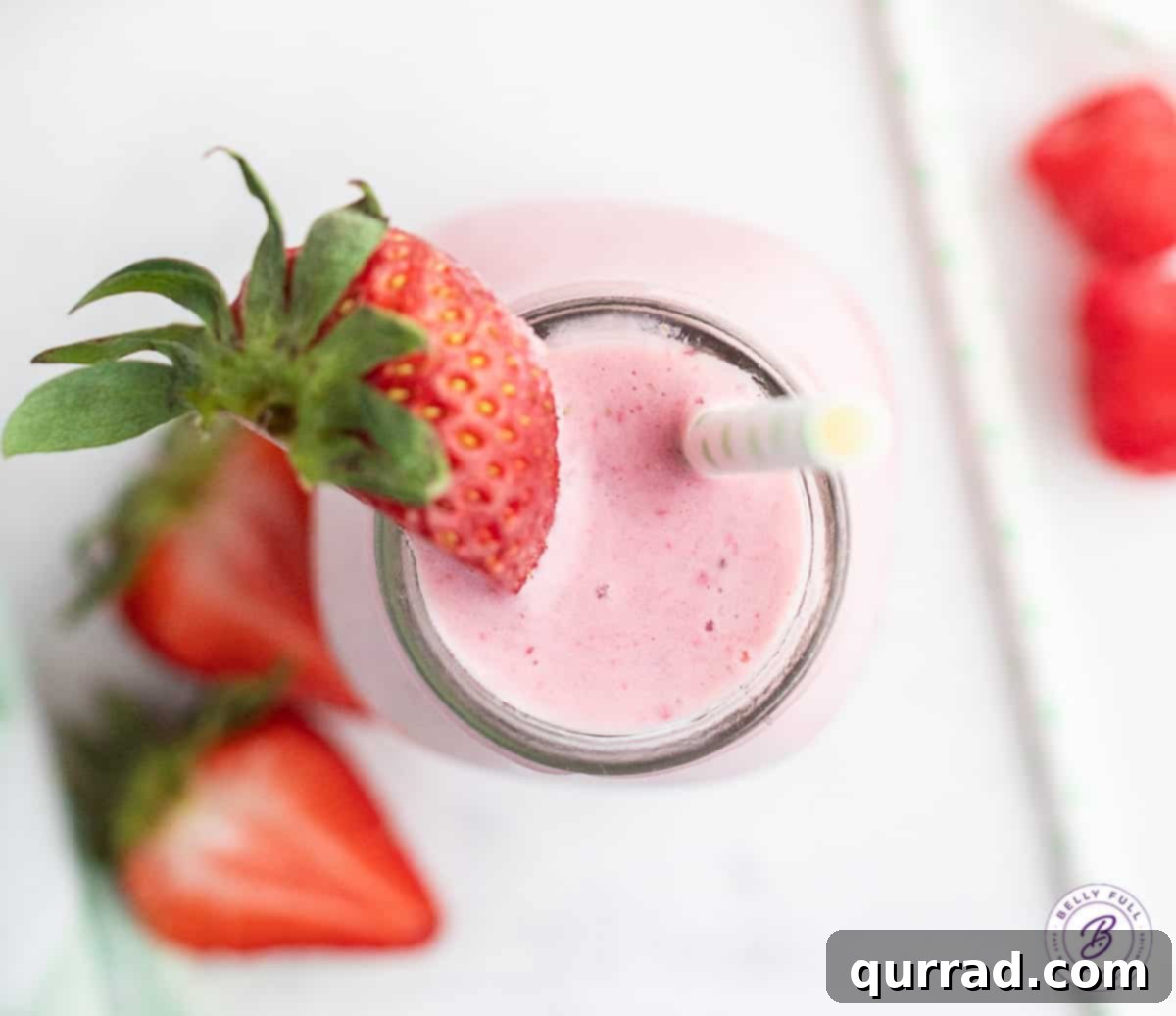 Velvet Strawberry Delight 3 overhead smoothie with strawberries