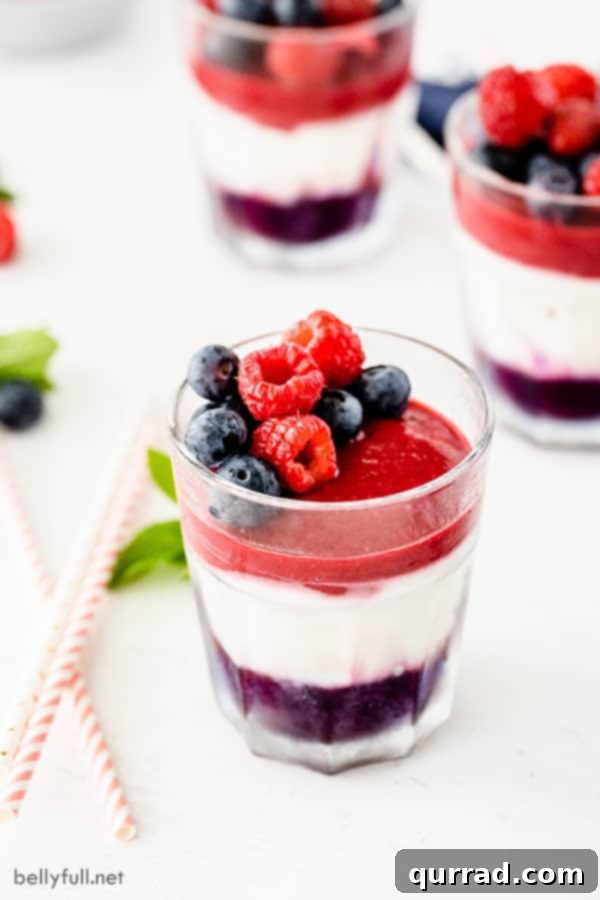 slushies with layers of pureed blueberries and raspberries, with Greek yogurt in between for a red white and blue look