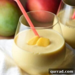 Finished Mango Orange Smoothie with fresh mangoes