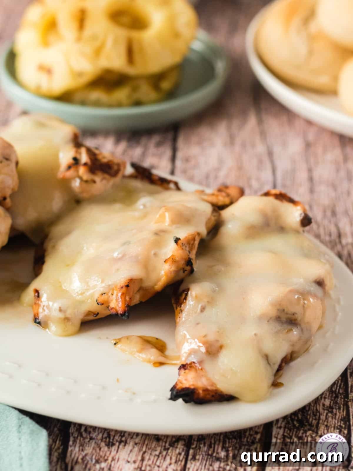 Aloha Grilled Chicken Stack 3 Two grilled chicken breasts with perfectly melted provolone cheese over the top, ready for assembly