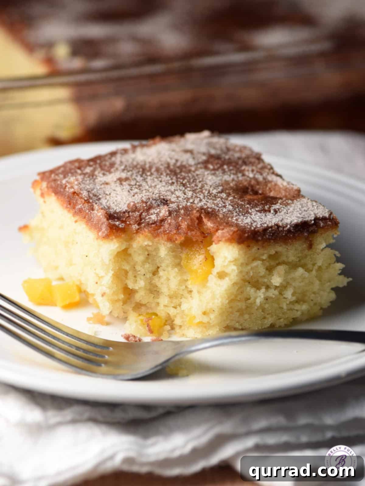 mango coffee cake with bite taken