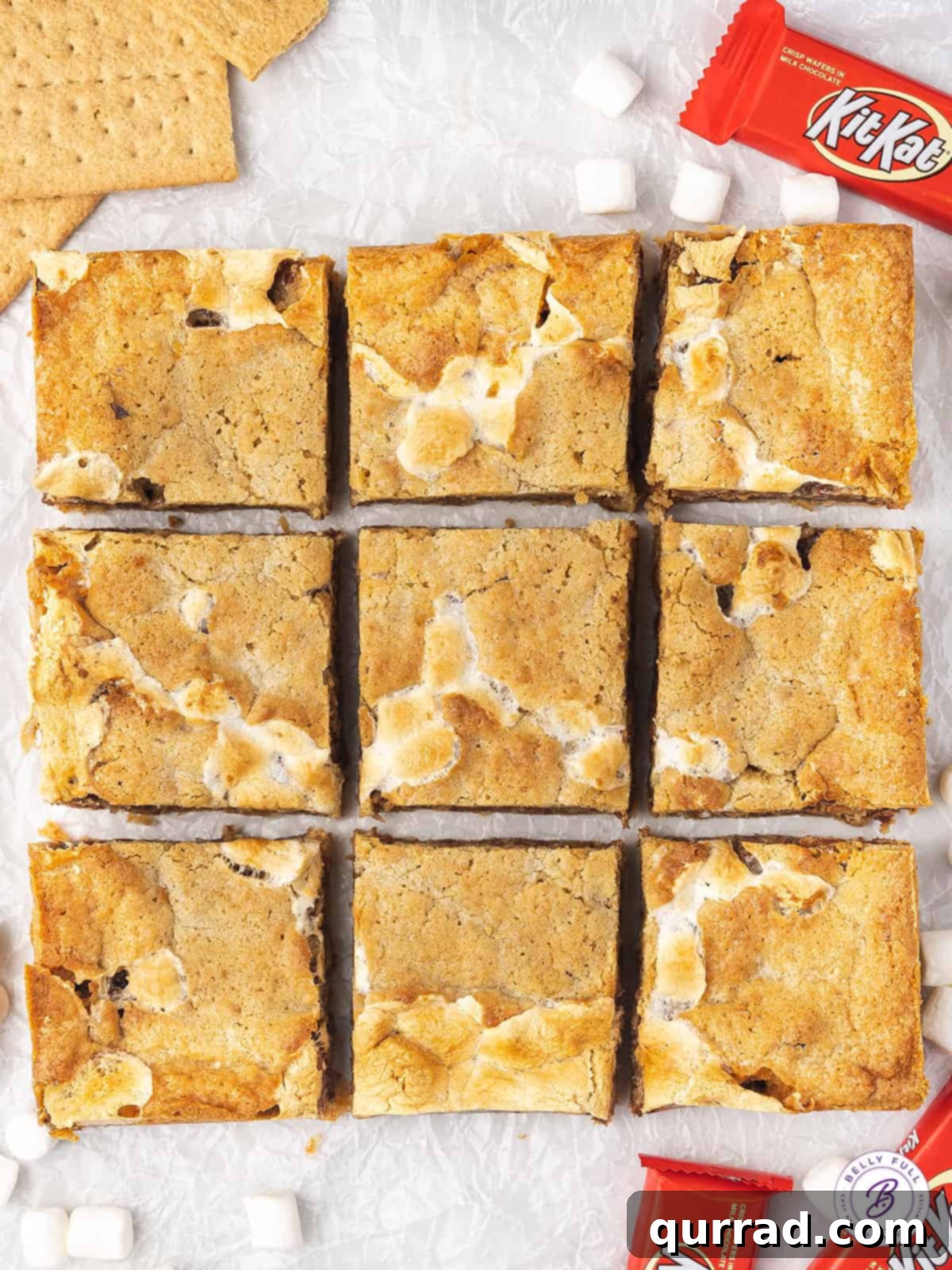 Kit-Kat S'mores Dream Bars 3 A perfectly cut slab of Kit Kat S'mores bars, divided into 9 individual servings, ready to be enjoyed.