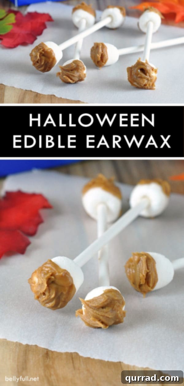 Edible Earwax Swabs - A stack of these easy no-bake Halloween treats, showcasing the gooey Biscoff spread and mini marshmallows.