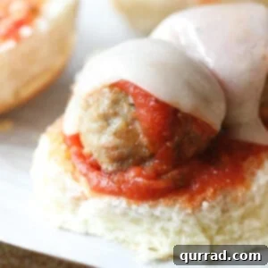 Speedy Meatball Sliders 5 meatball sliders on baking sheet