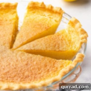 Side view of lemon curd pie with two slices