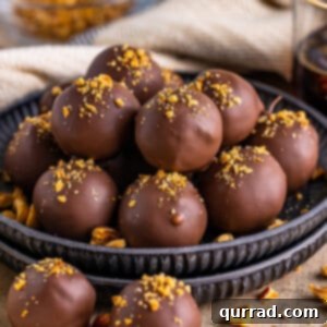 Kahlua Infused Chocolate Delights 6 Plate of Kahlúa Chocolate Truffles garnished with hazelnut crumbs