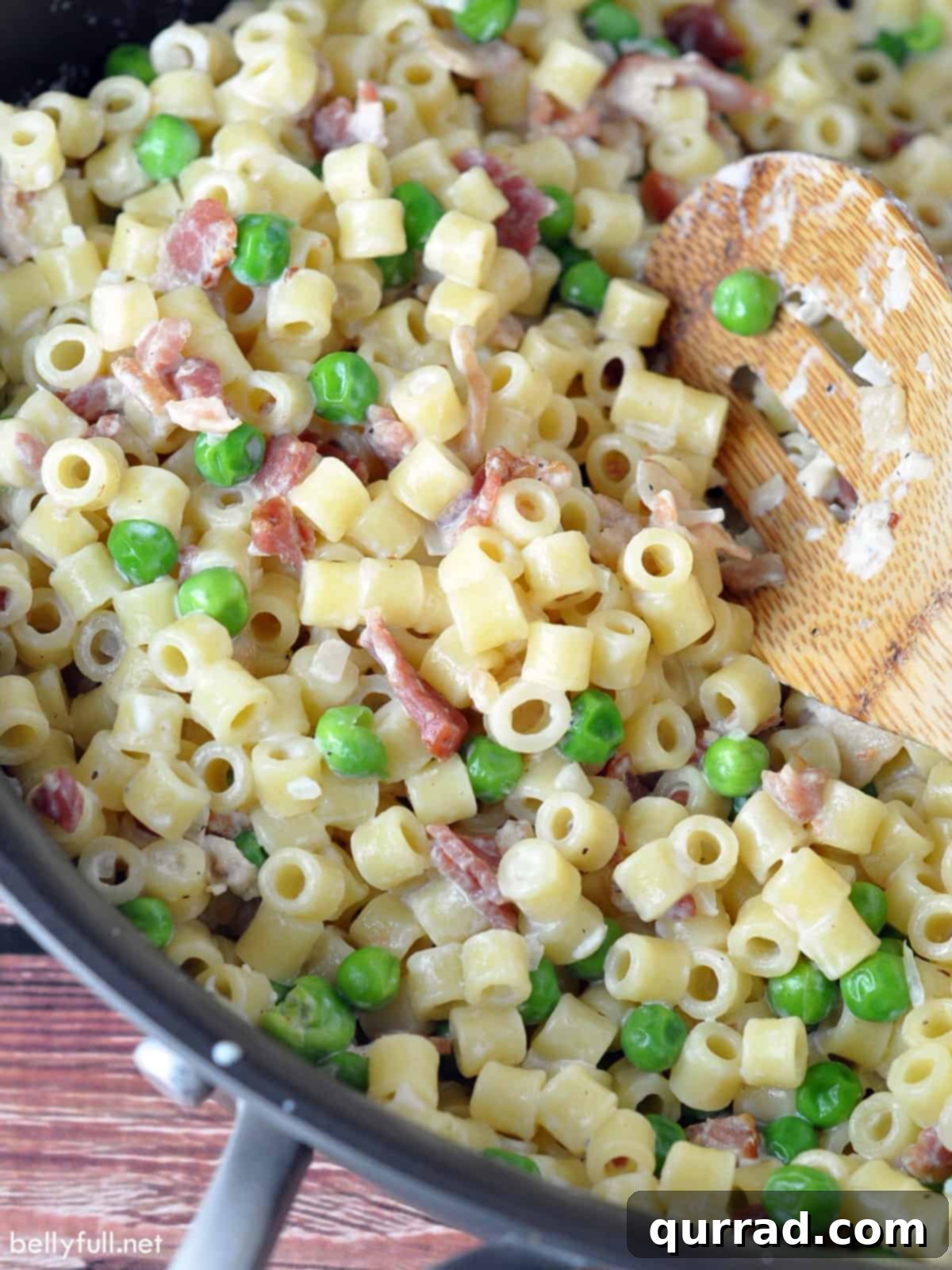 Silky Pasta with Smoked Bacon and Sweet Peas 2 overhead bacon and peas pasta in skillet