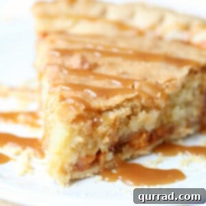 slice of butterscotch pie with caramel drizzle