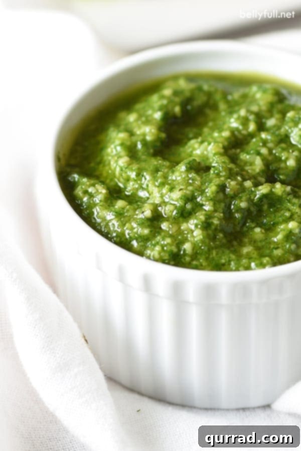 Emerald Isle Wonton Snaps 3 basil pesto in white ramekin, showing its vibrant green color