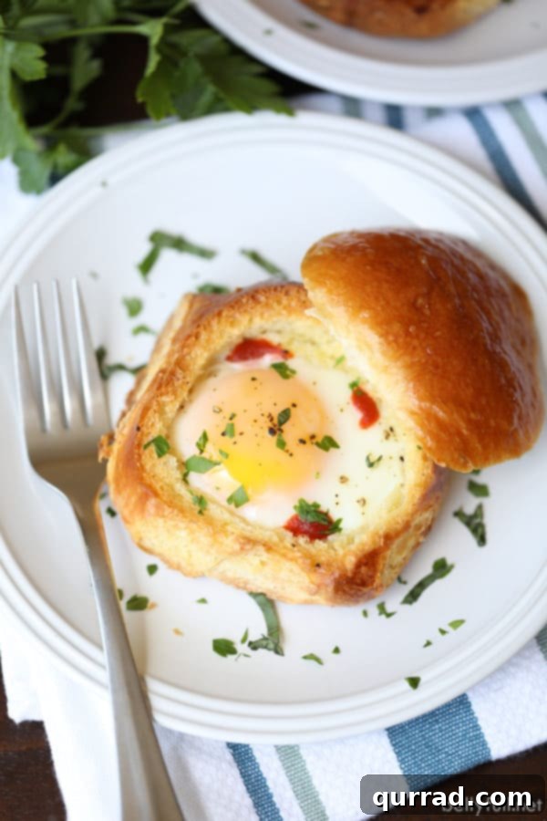 Golden Toasted Brioche Egg Cups with baked eggs and herbs