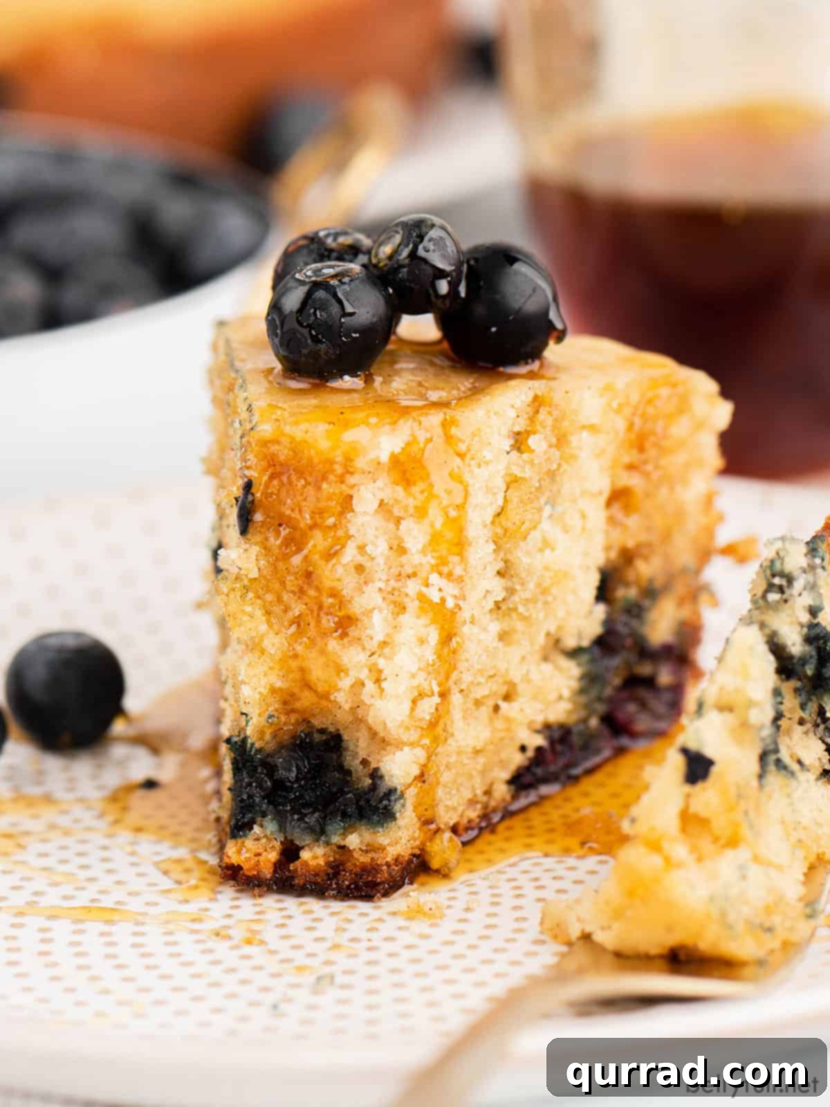 Fluffy Rice Cooker Pancakes 6 slice of rice cooker pancake with maple syrup and blueberries