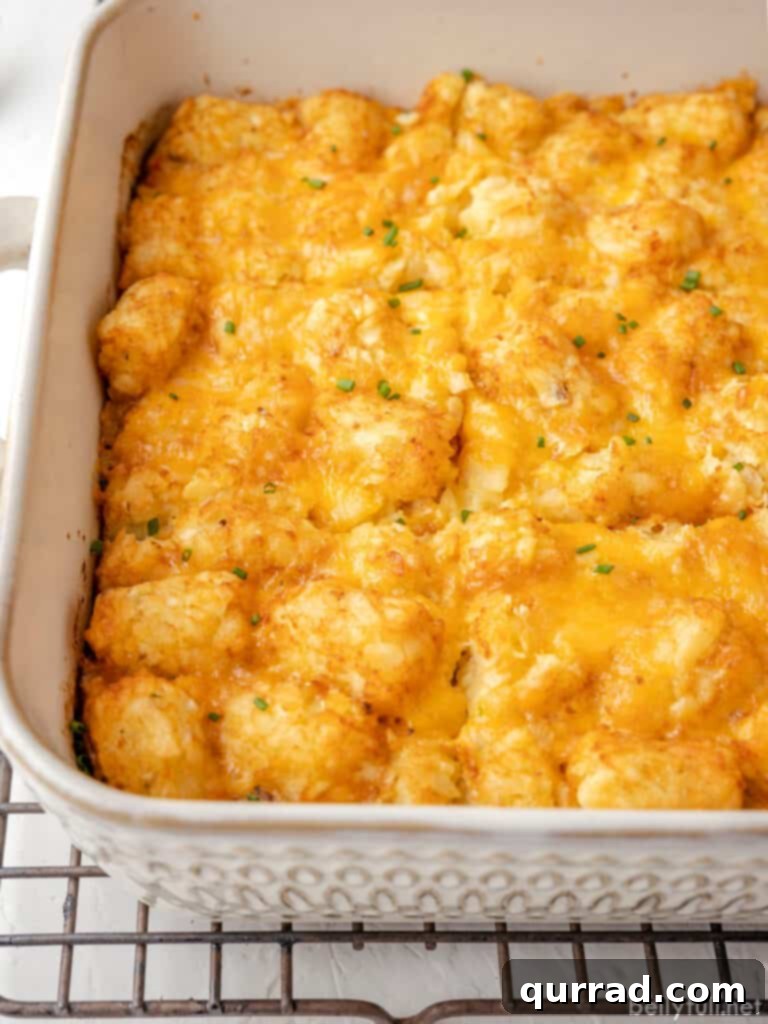 Delicious Tater Tot Breakfast Casserole freshly baked in a rectangular baking dish, ready to be served.