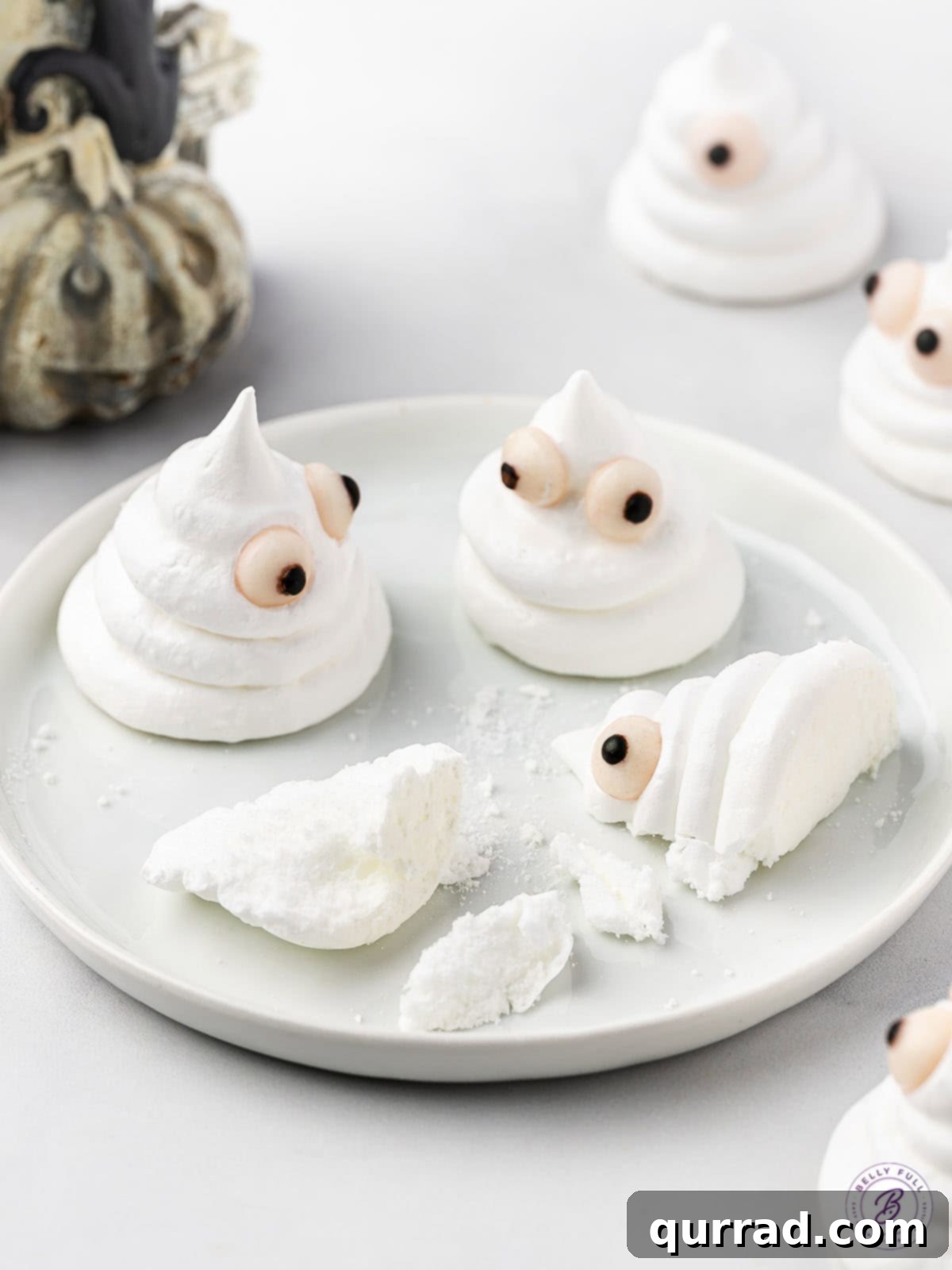 Spectral Meringue Kisses 5 3 ghost cookies on plate