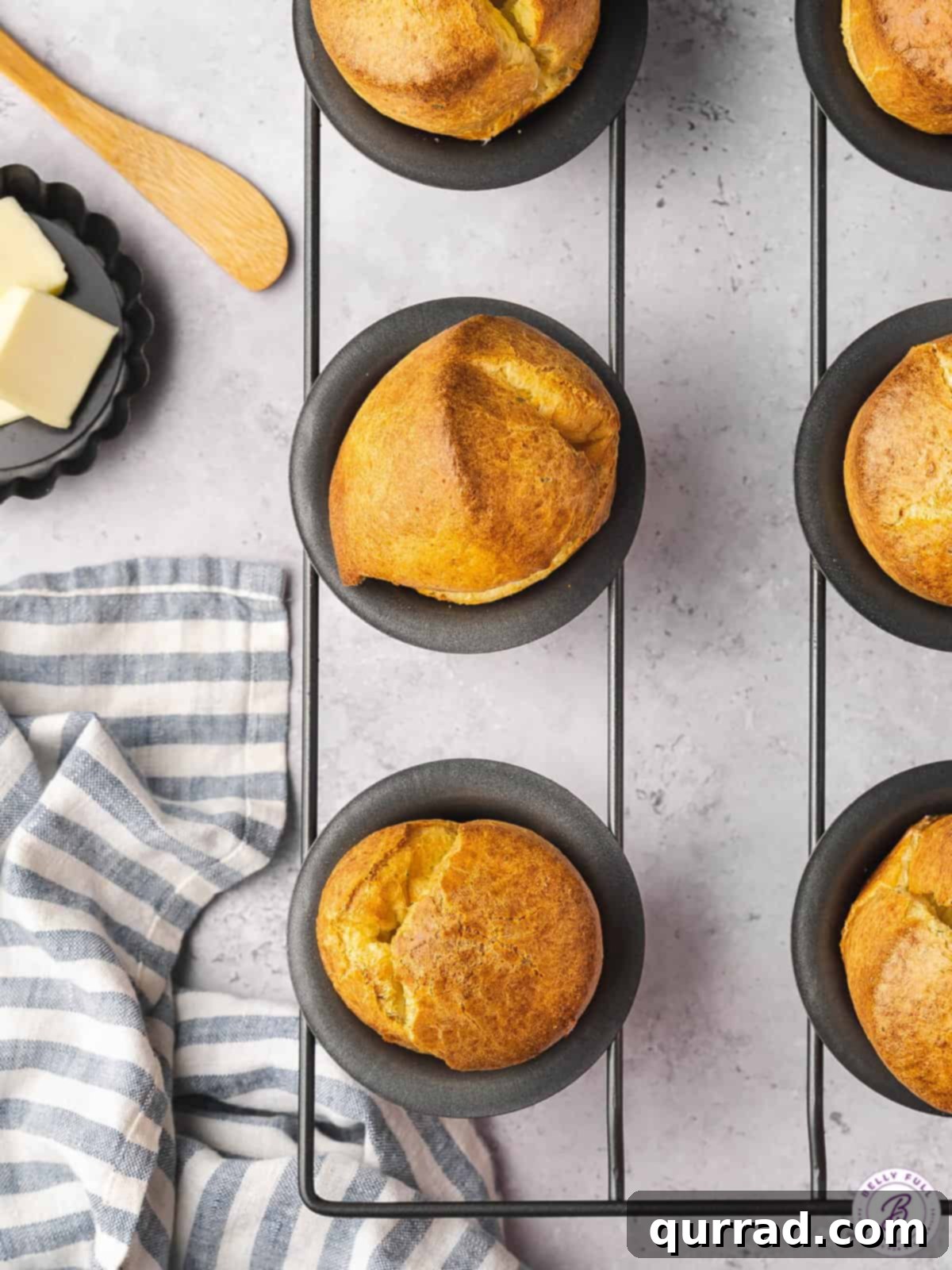 Fluffy Cheesy Popovers 3 overhead baked popovers in popover pan