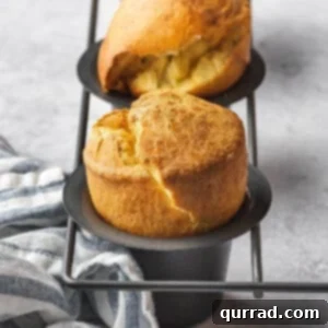 Fluffy Cheesy Popovers 6 golden domed popover roll in pan