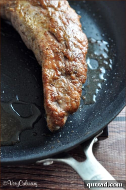 Cumin Seared Pork Tenderloin with a Raisin Pine Nut Relish - a perfect blend of savory, sweet, and tangy flavors.
