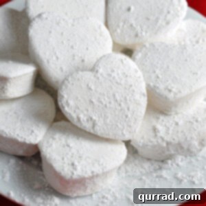 Plate full of heart shaped homemade marshmallows
