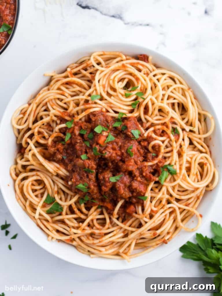 Bolognese Sauce 3 bowl of spaghetti topped with meat sauce