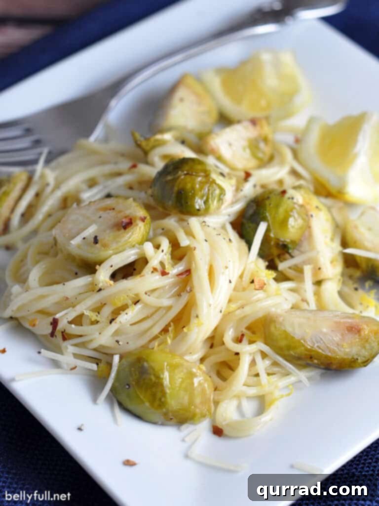 creamy lemon pasta with brussels sprouts on plate with fork