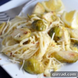 creamy lemon pasta with brussels sprouts on plate with fork