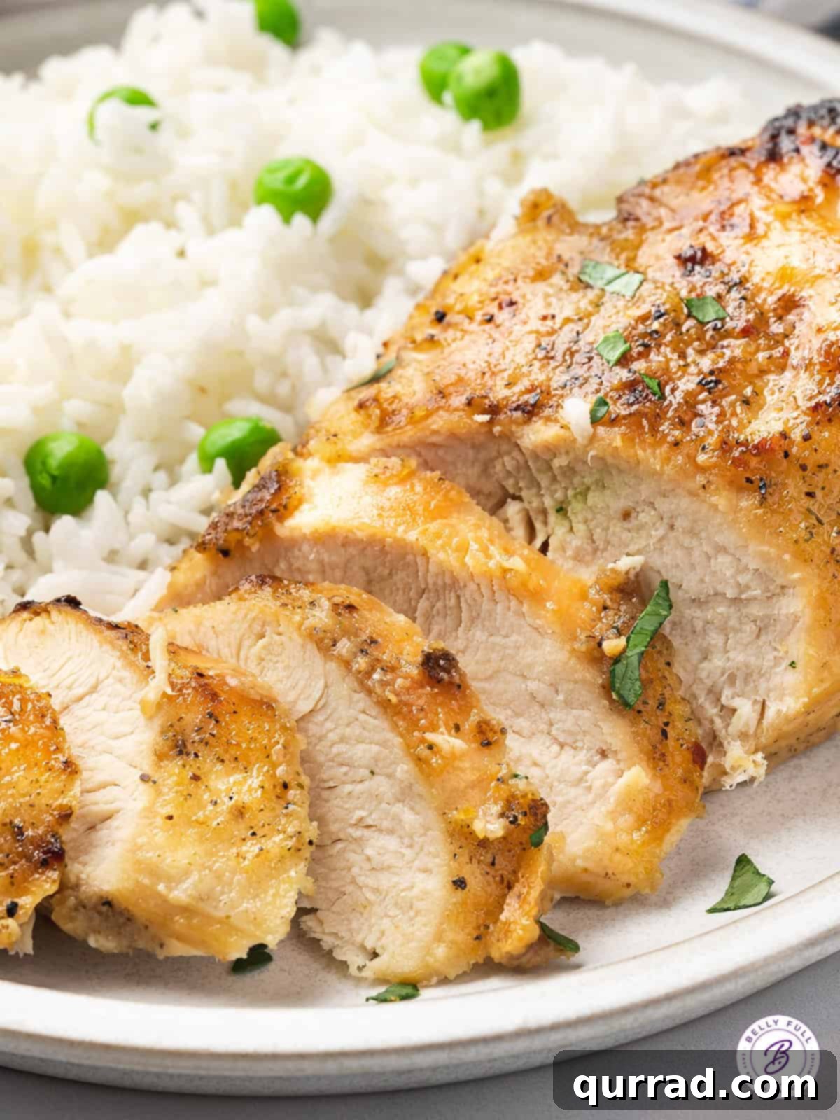 close up sliced chicken breast with golden crust