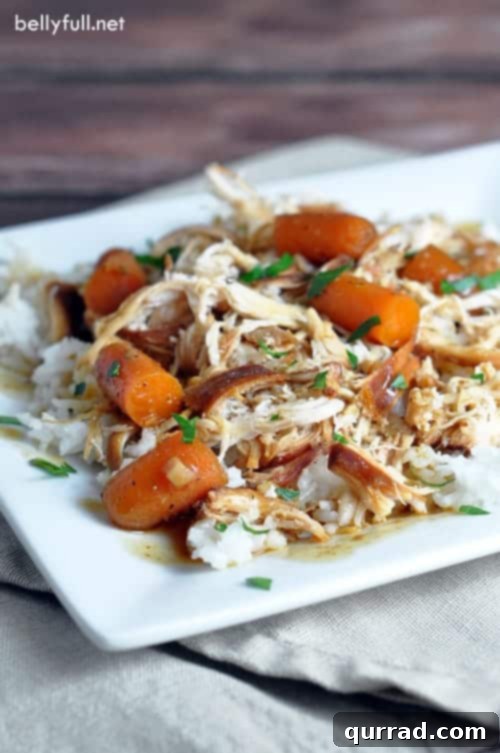 Delicious Slow Cooker Garlic and Brown Sugar Chicken with baby carrots served over rice