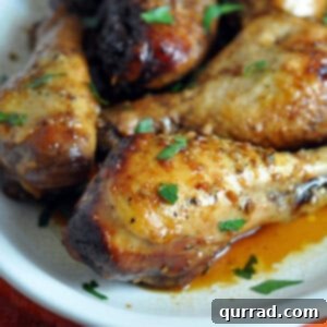 Crockpot Sticky Honey-Soy Chicken 5 close up glazed honey soy chicken drumstick
