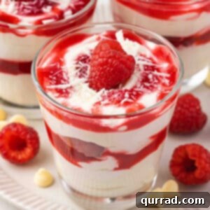 white chocolate cheesecake raspberry parfaits toped with fresh raspberry