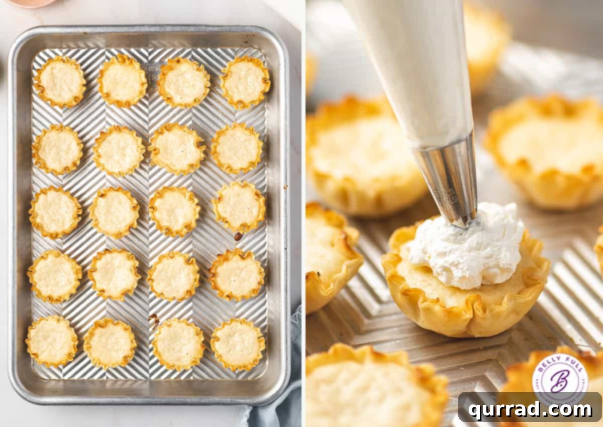 Effortless Tangy Lemon Tartlets 4 whipped cream being piped on mini lemon tarts