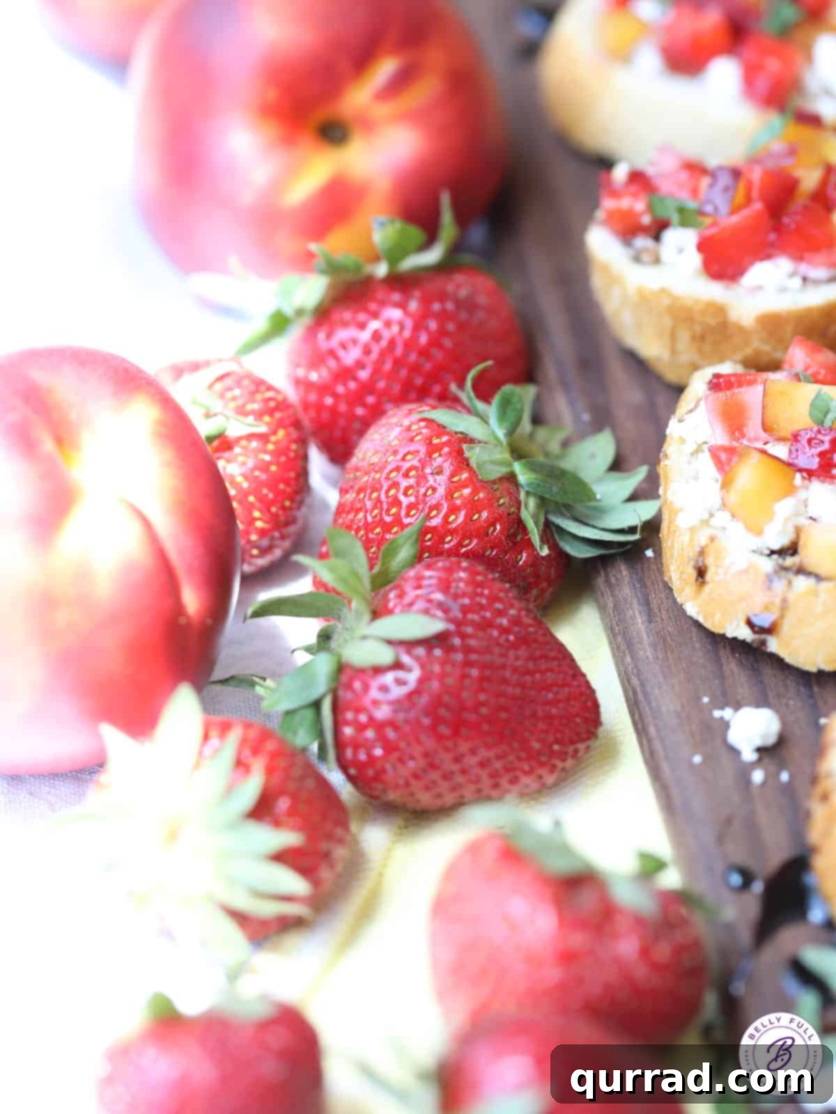Sweet Summer Toasts 3 Close-up of freshly diced strawberries and nectarines, glistening and ready to be combined for a delicious fruit bruschetta topping.