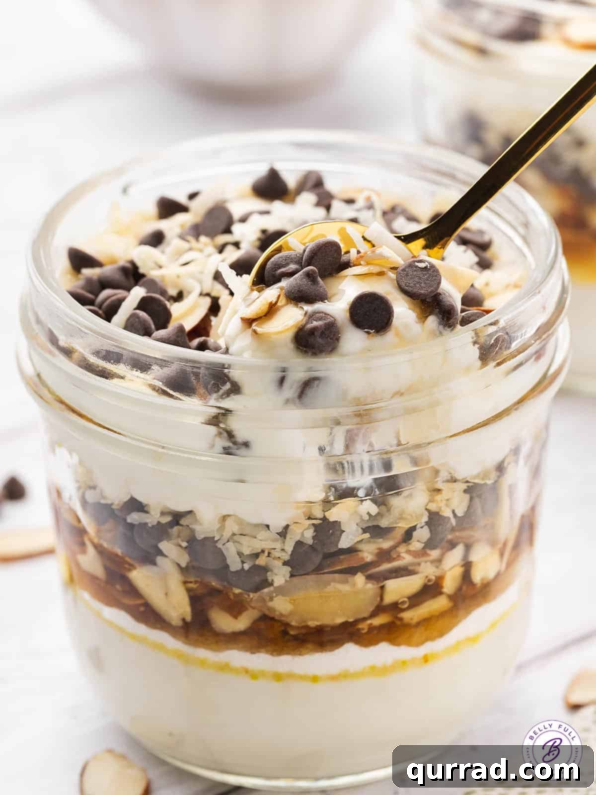 Creamy Coconut Almond Parfait Dream 5 close up spoonful of yogurt and chocolate chips