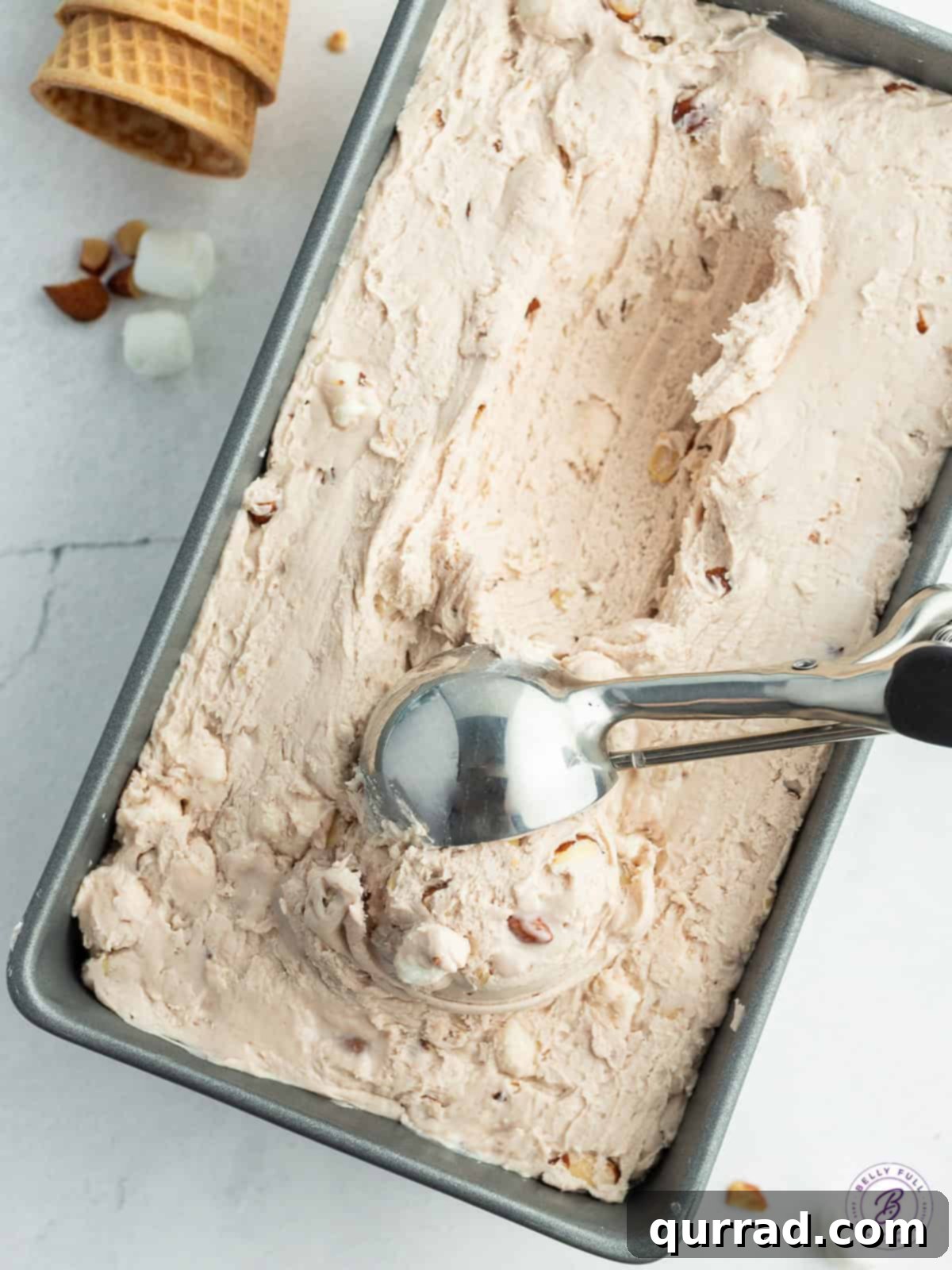 Effortless Rocky Road Ice Cream Indulgence 3 overhead ice cream in 9x5 loaf pan being scooped