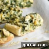 Spinach Artichoke French Bread Pizza, a close-up of the finished dish.