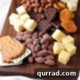 A featured image of the DIY Cheese and Nut Board for the recipe card.